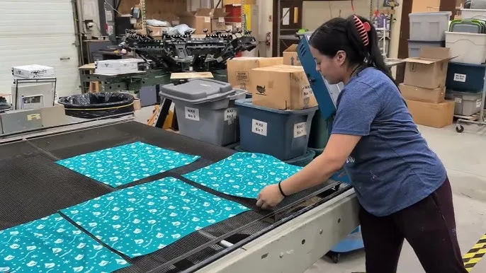 High-quality logo bandannas laid out for trade shows, festivals, or corporate marketing campaigns.